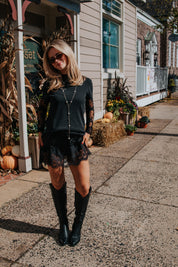 Meet Me In The Middle Mini Slip Skirt | Black | Free People
