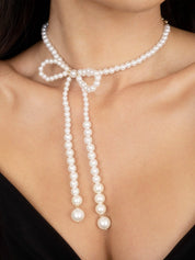 Venus Pearl Bow Necklace: Acrylic Pearl / One Size