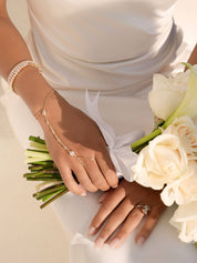 Dripping Crystal Hand Chain: Clear Crystal with Silver Plating / One Size