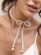 Venus Pearl Bow Necklace: Acrylic Pearl / One Size