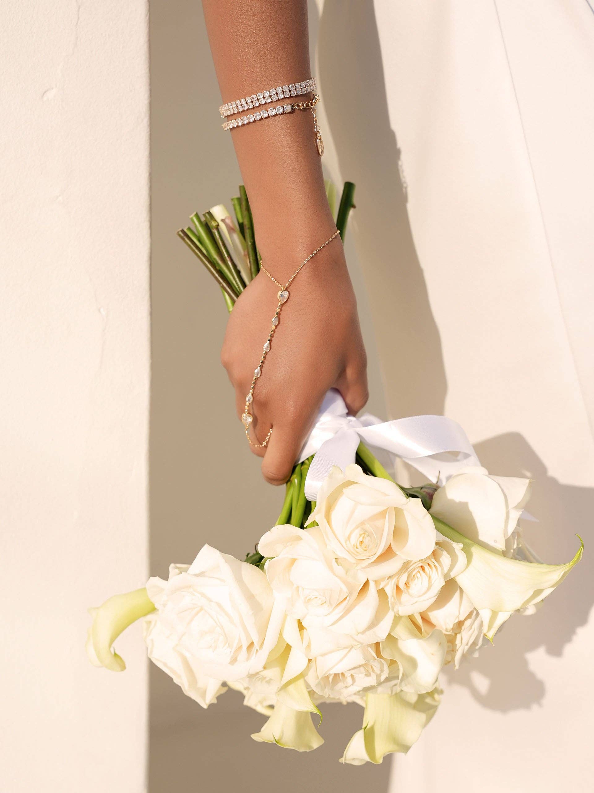 Dripping Crystal Hand Chain: Clear Crystal with Silver Plating / One Size