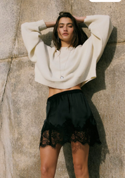 Meet Me In The Middle Mini Slip Skirt | Black | Free People