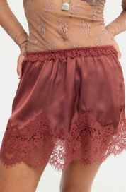 Meet Me In The Middle Mini Slip Skirt | Henna | Free People