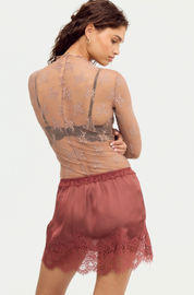 Meet Me In The Middle Mini Slip Skirt | Henna | Free People