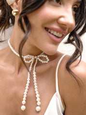 Venus Pearl Bow Necklace: Acrylic Pearl / One Size