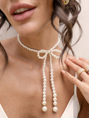 Venus Pearl Bow Necklace: Acrylic Pearl / One Size